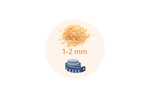 Ein Haufen Granulat, beschriftet mit "Grösse 1-2 mm", neben einer blauen Messskala.