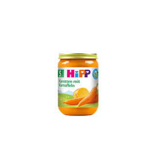 HiPP Bio Babygläschen Karotten mit Kartoffeln ab dem 5. Monat, Glas mit orangefarbenem Gemüsebrei auf schwarzem Hintergrund