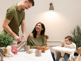 Family eating breakfast together