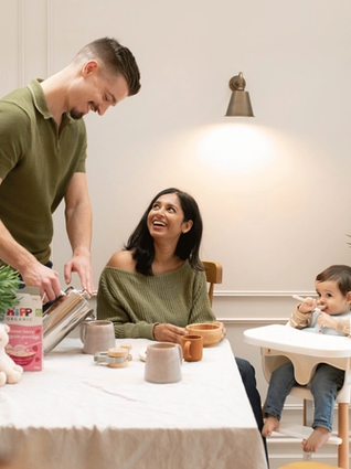 Family eating breakfast together