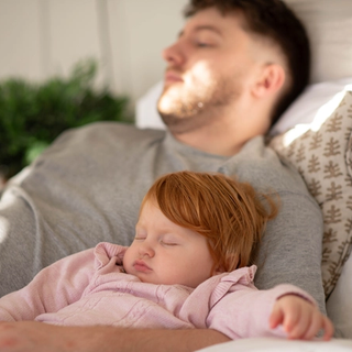 Toddler contact napping with dad