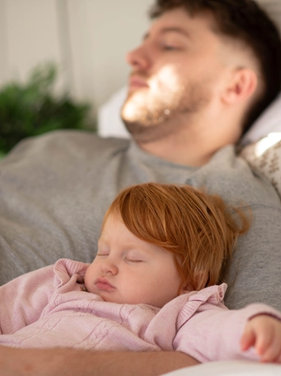 Toddler contact napping with dad