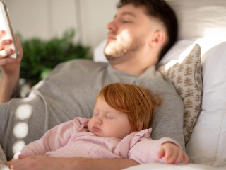 Toddler contact napping with dad