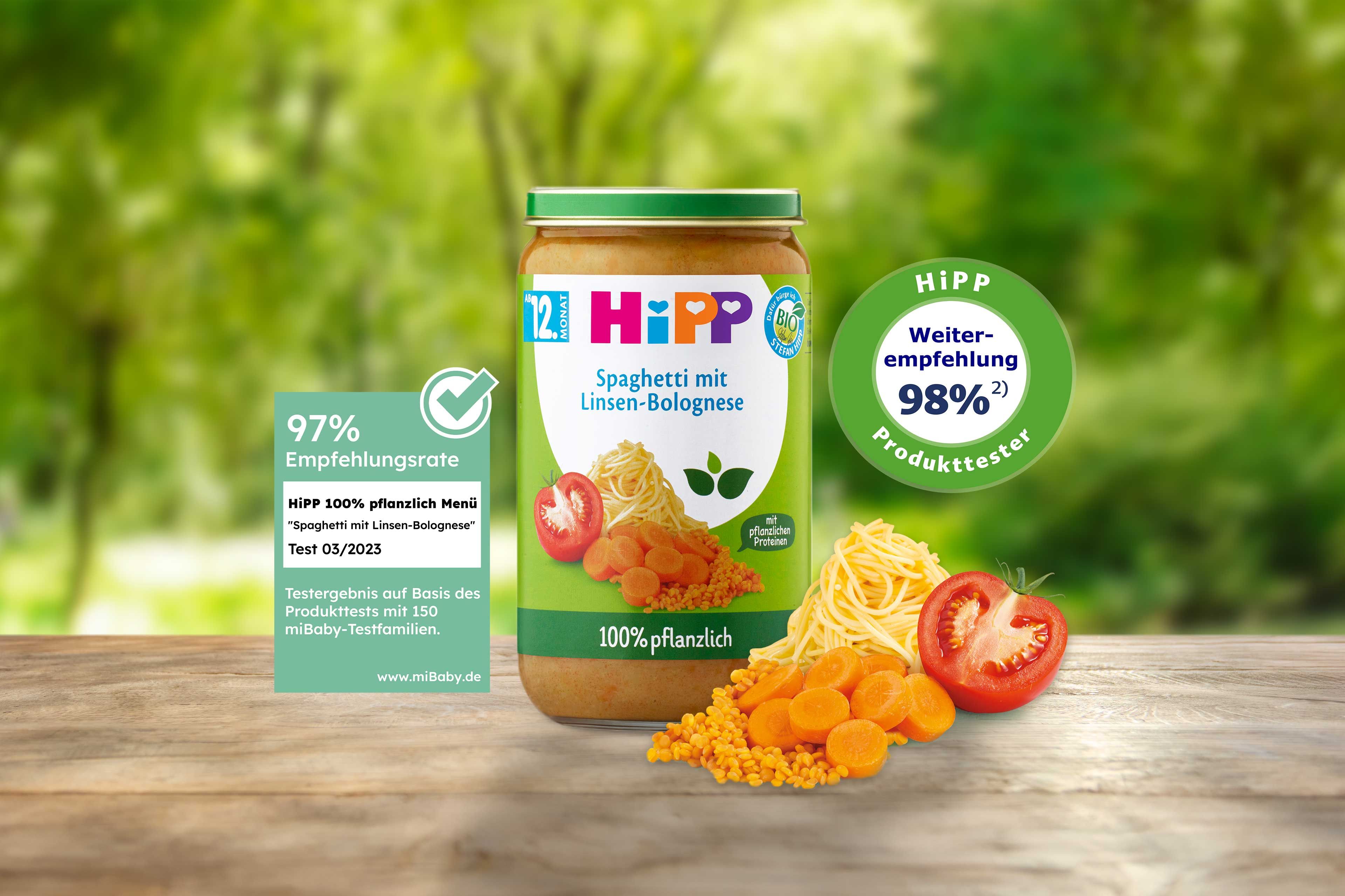 HiPP 100% pflanzlich Menü „Spaghetti mit Linsen-Bolognese“ im Glas mit Gemüsezutaten, 97–98 % Empfehlungssiegeln und BIO-Hinweis.