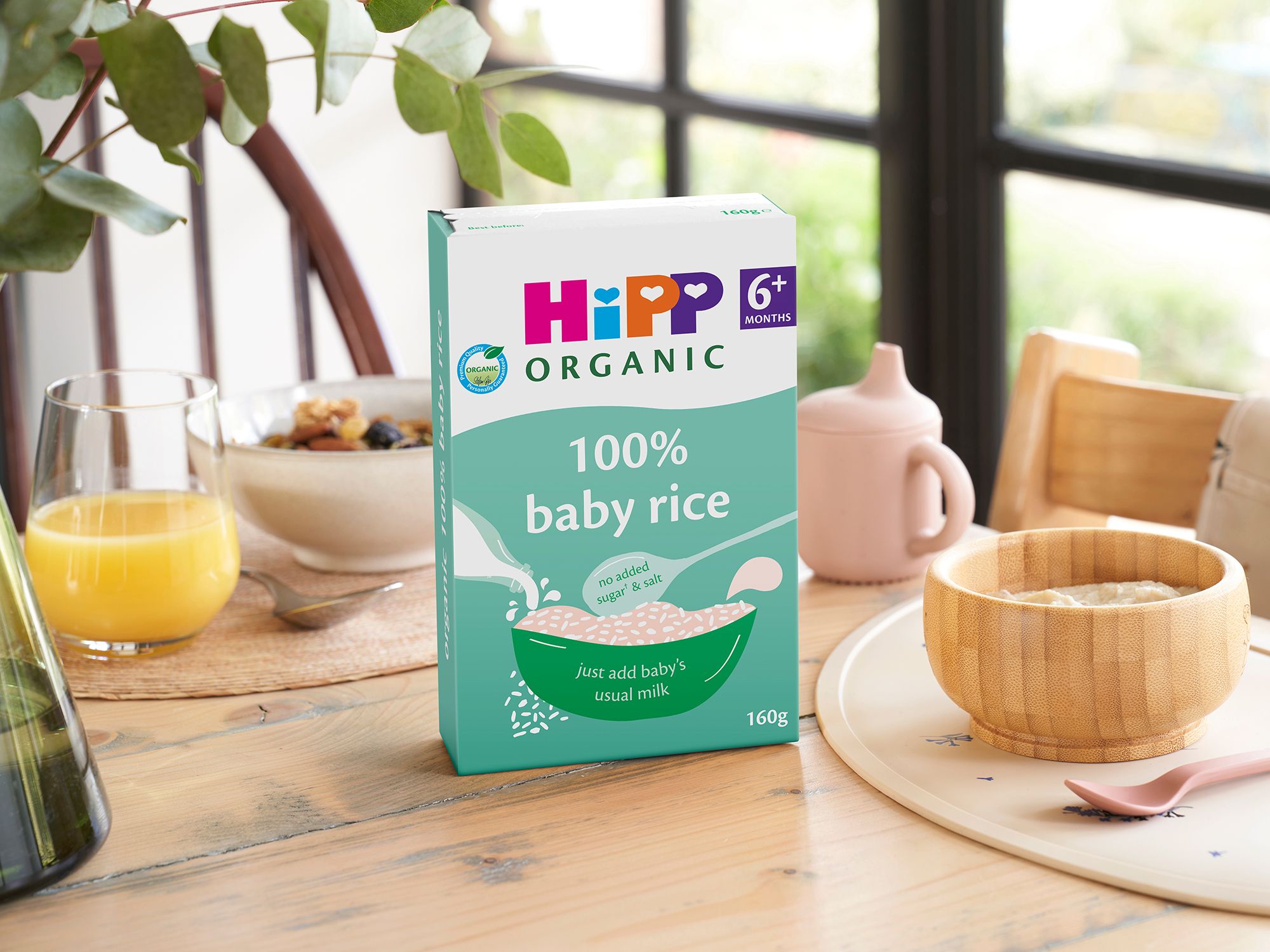 HiPP Organic 100% Baby Rice on kitchen worktop next to cereal bowl