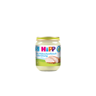 HiPP Bio-Hühnchenfleisch Zubereitung im Glas für Babys ab dem 5. Monat vor schwarzem Hintergrund