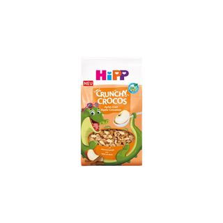 HiPP Crunchy Crocos Apfel-Zimt Bio-Kinder-Müsli mit fröhlichem Krokodil-Maskottchen auf orangefarbener Verpackung