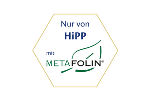 Sechseckiges HiPP-Siegel mit der Aufschrift „Nur von HiPP mit Metafolin®“ und grünem Blatt-Symbol für Premium-Folatquelle.