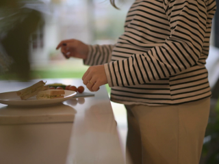 Expecting mum preparing her lunch