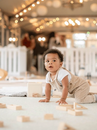 Baby playing with wooden blocks