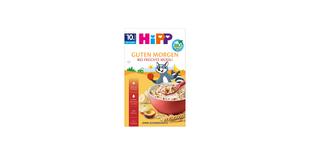 HiPP Guten Morgen Bio Früchte-Müesli Packung mit roter Müslischale, Obststücken und fröhlichem Waschbär-Maskottchen