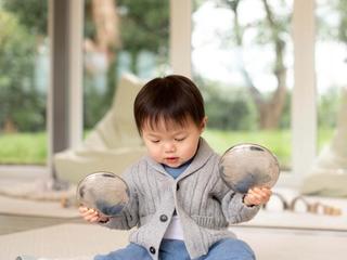 Toddler playing with toys