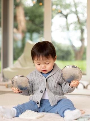 Toddler playing with toys