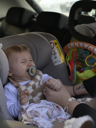 Baby crying whilst being put in car seat