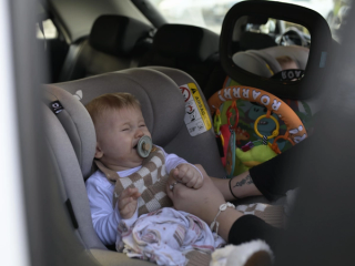 Baby crying whilst being put in car seat
