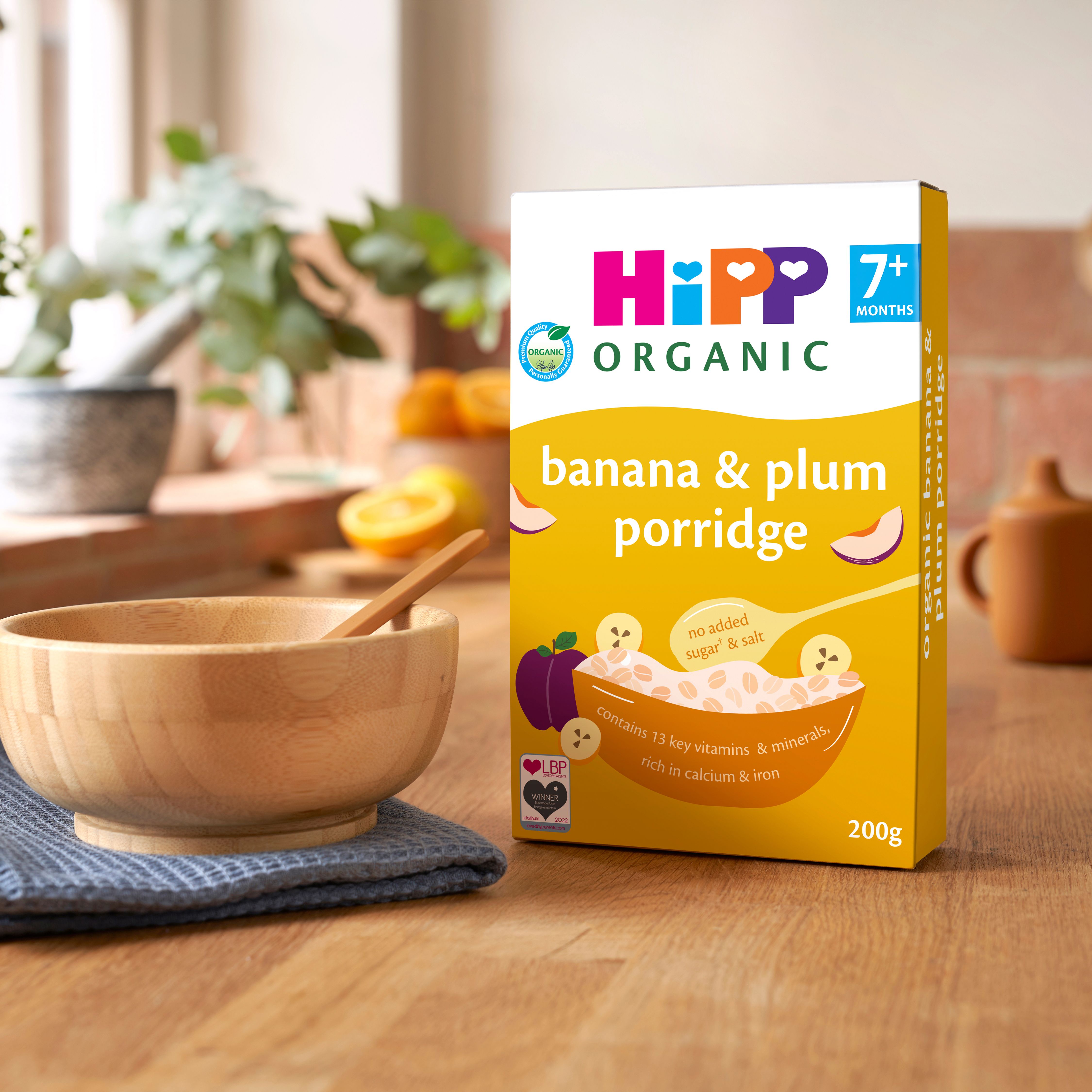HiPP Organic Banana & Plum Porridge on a kitchen worktop