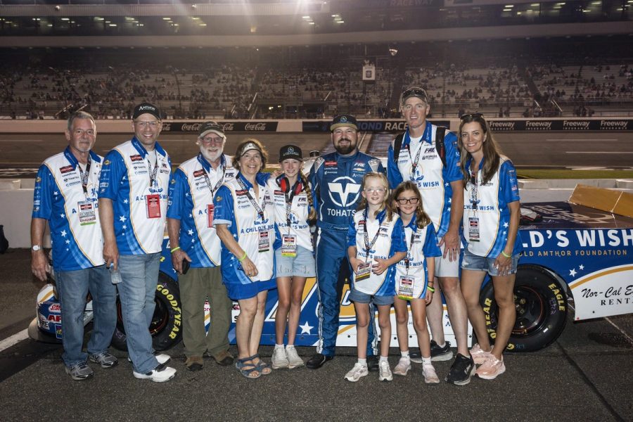 Family group with the No. 76 truck