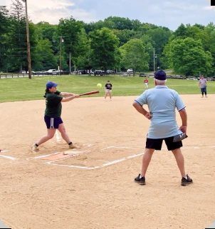 A batter swings at the plate