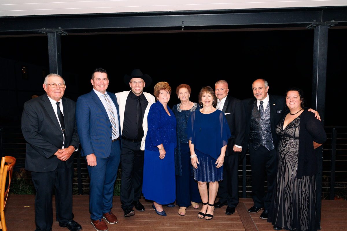 Board members and guests on the deck