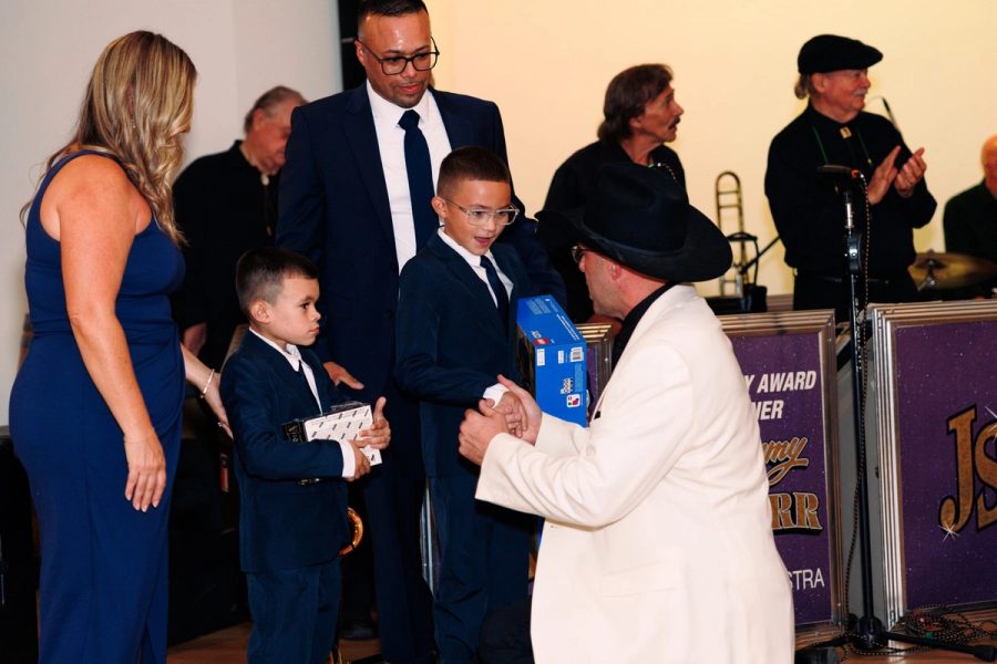 Jimmy Sturr greets a young guest