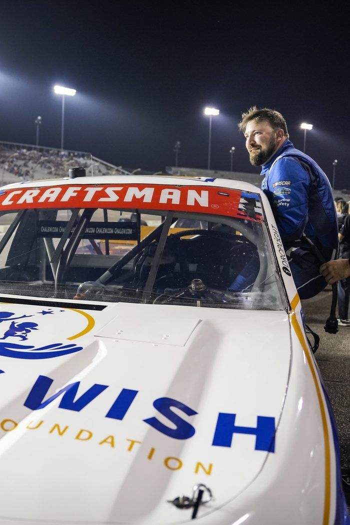 The A Child's Wish logo across the hood of the No. 76