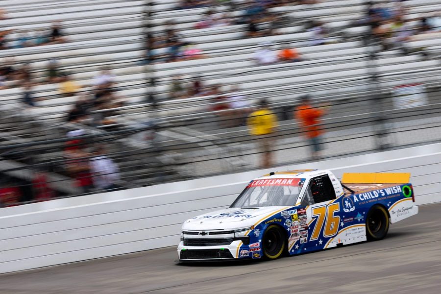 The No. 76 passes the grandstand