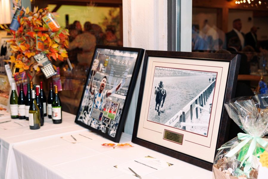 Signed memorabilia and wine at the silent auction