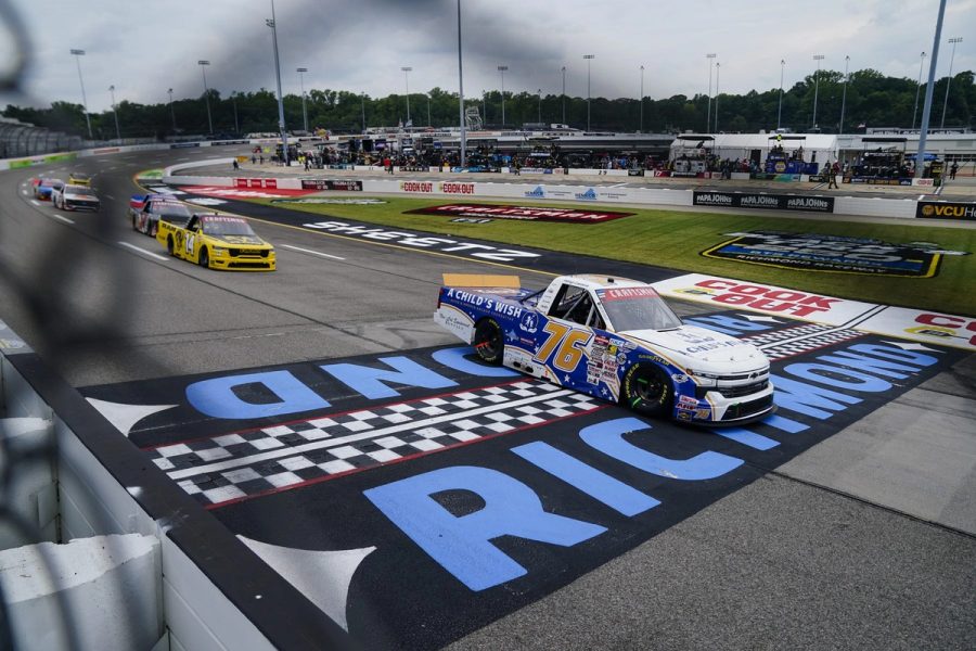 The No. 76 crossing the Richmond Raceway logo
