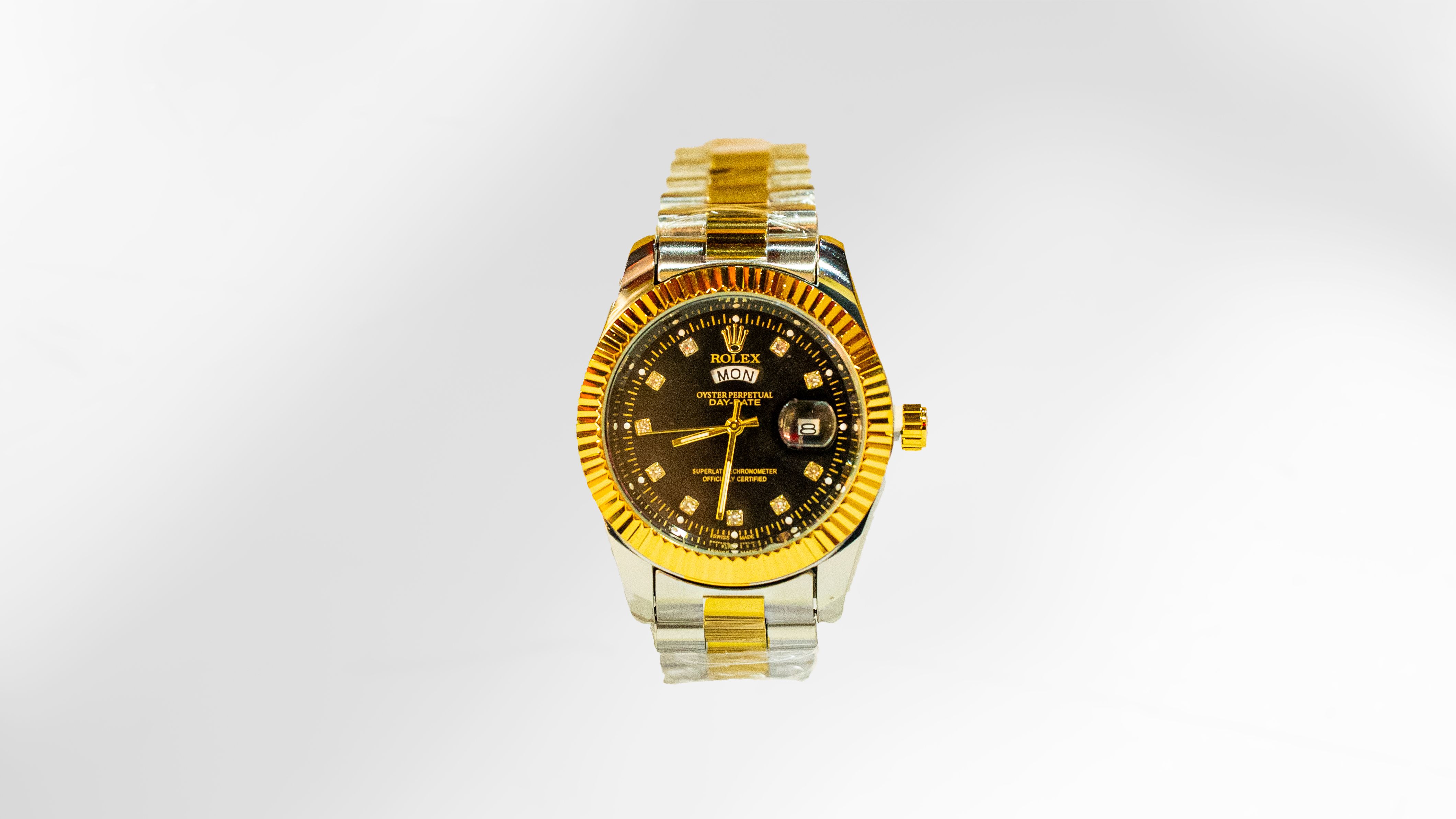 Rolex: Day-Date Black Diamond Two-Tone Gold