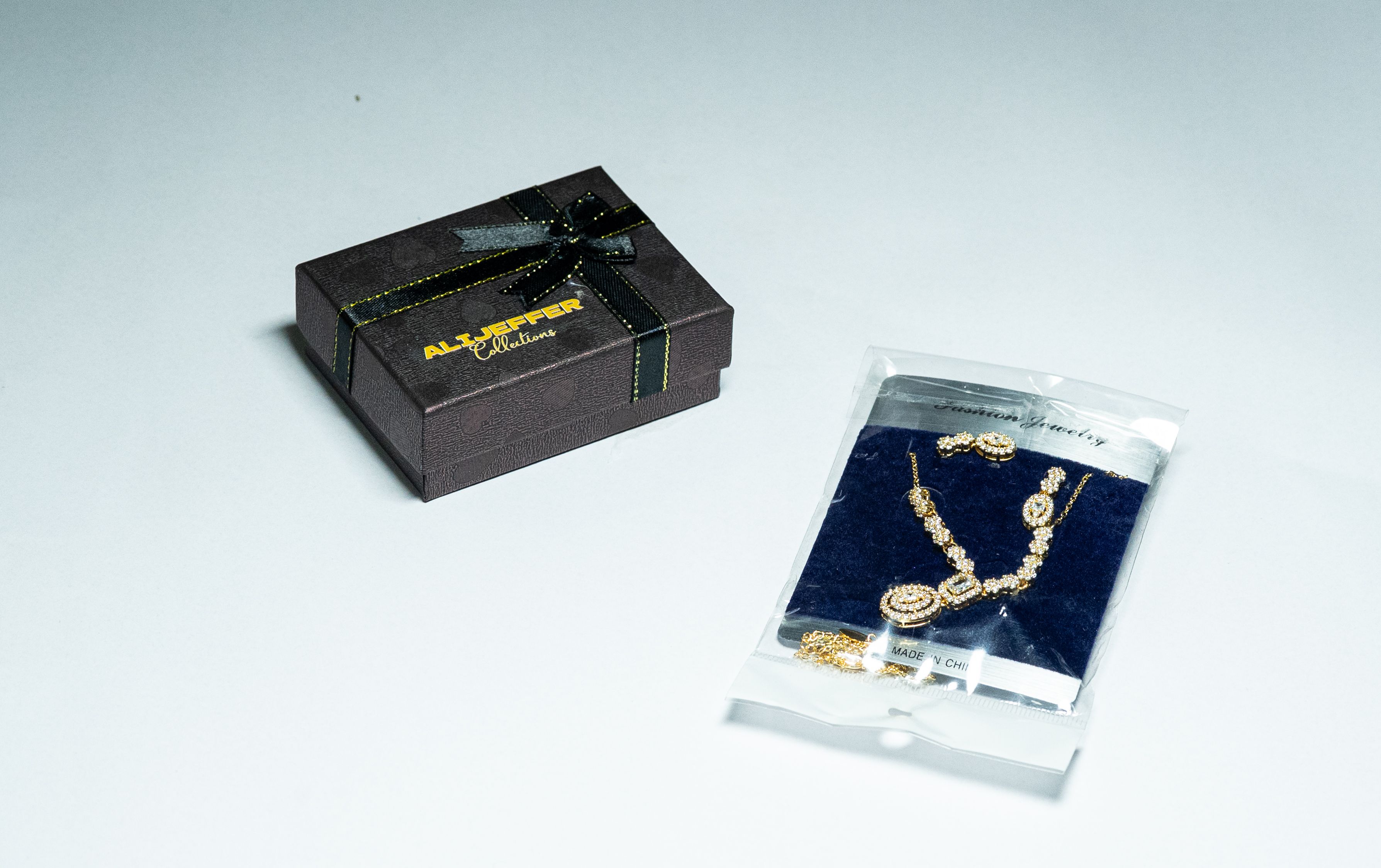 Golden Oval Cascade Necklace and Earring Set thumbnail 2