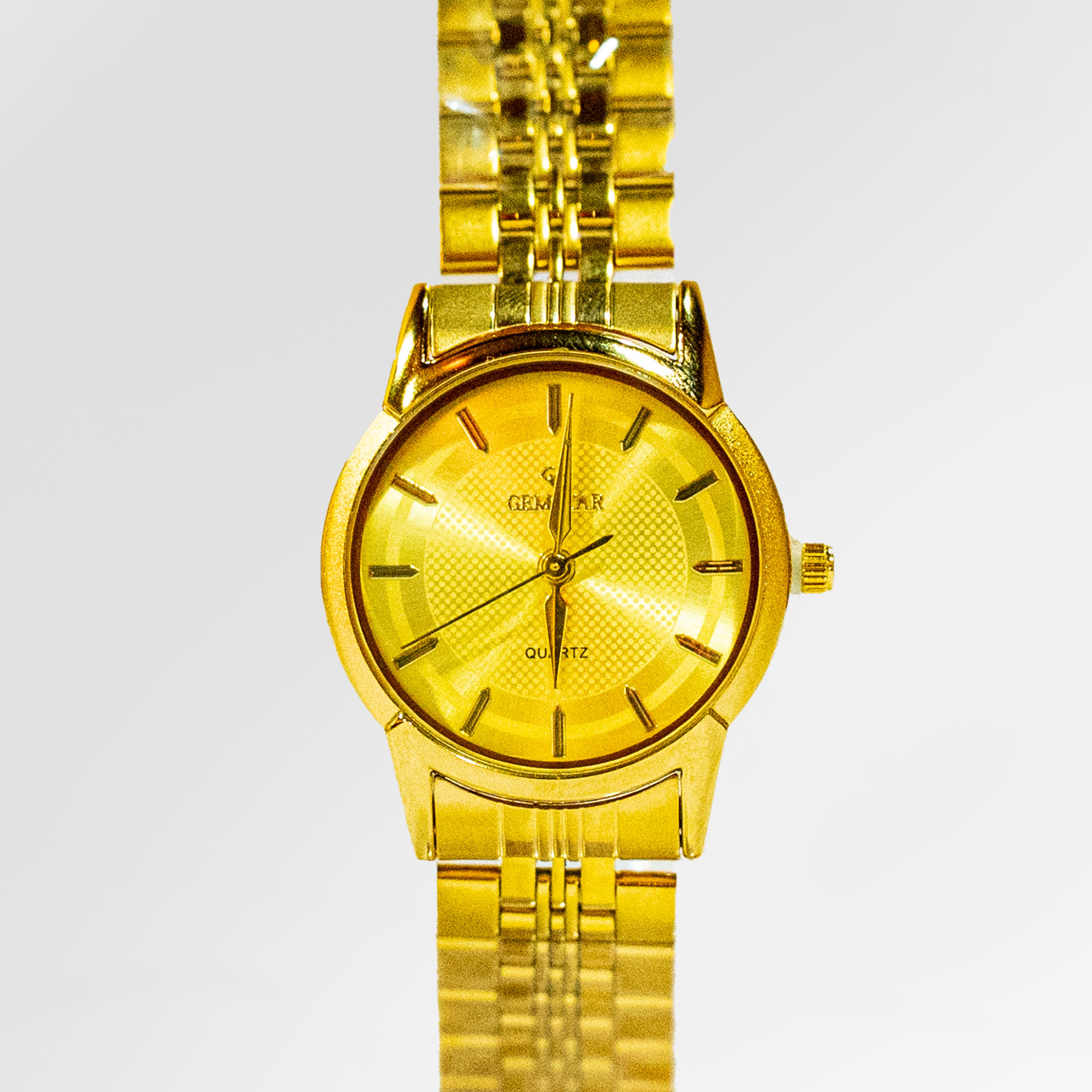 Gemstar Ladies Slim Gold Analog