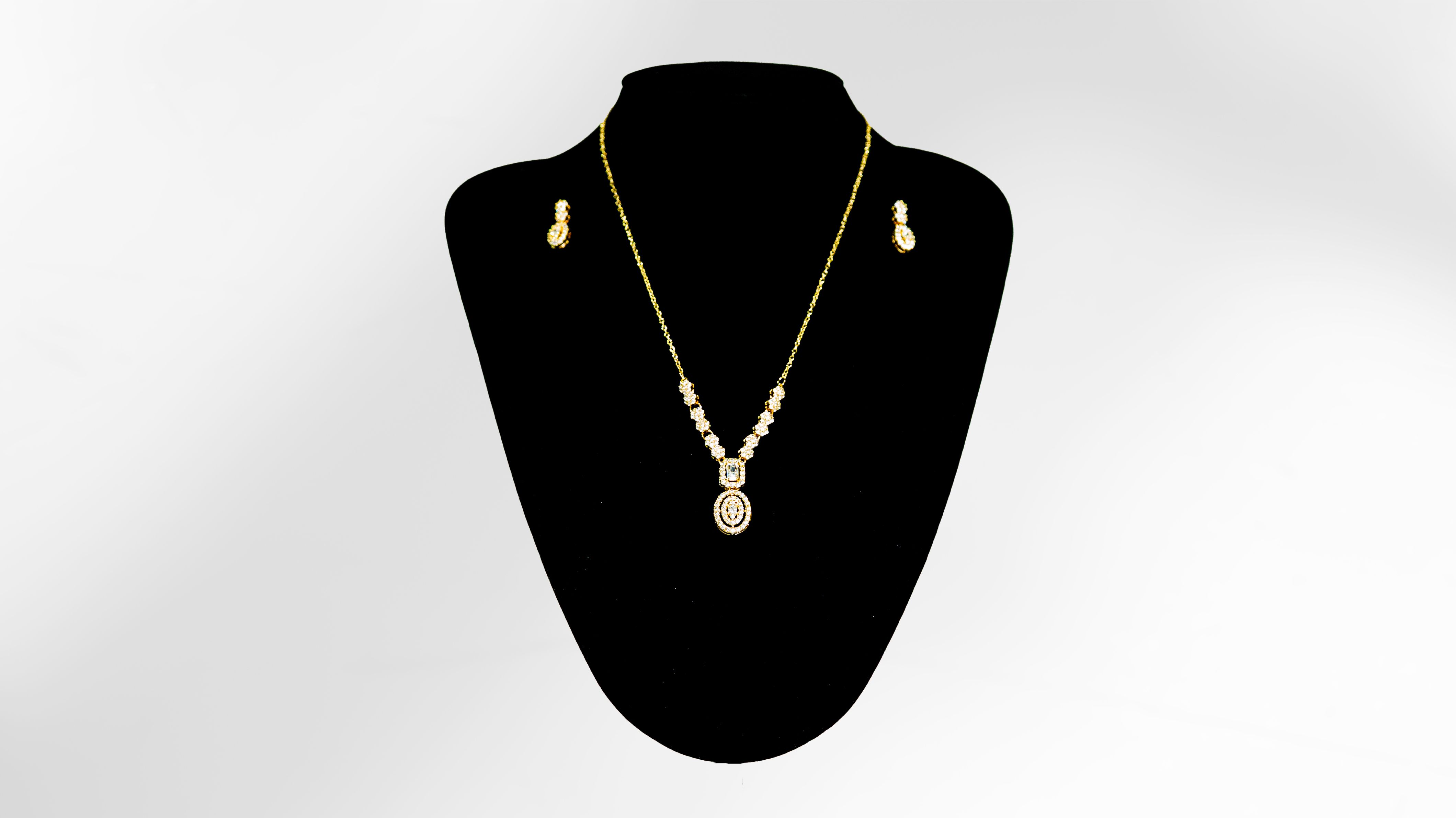 Golden Oval Cascade Necklace and Earring Set