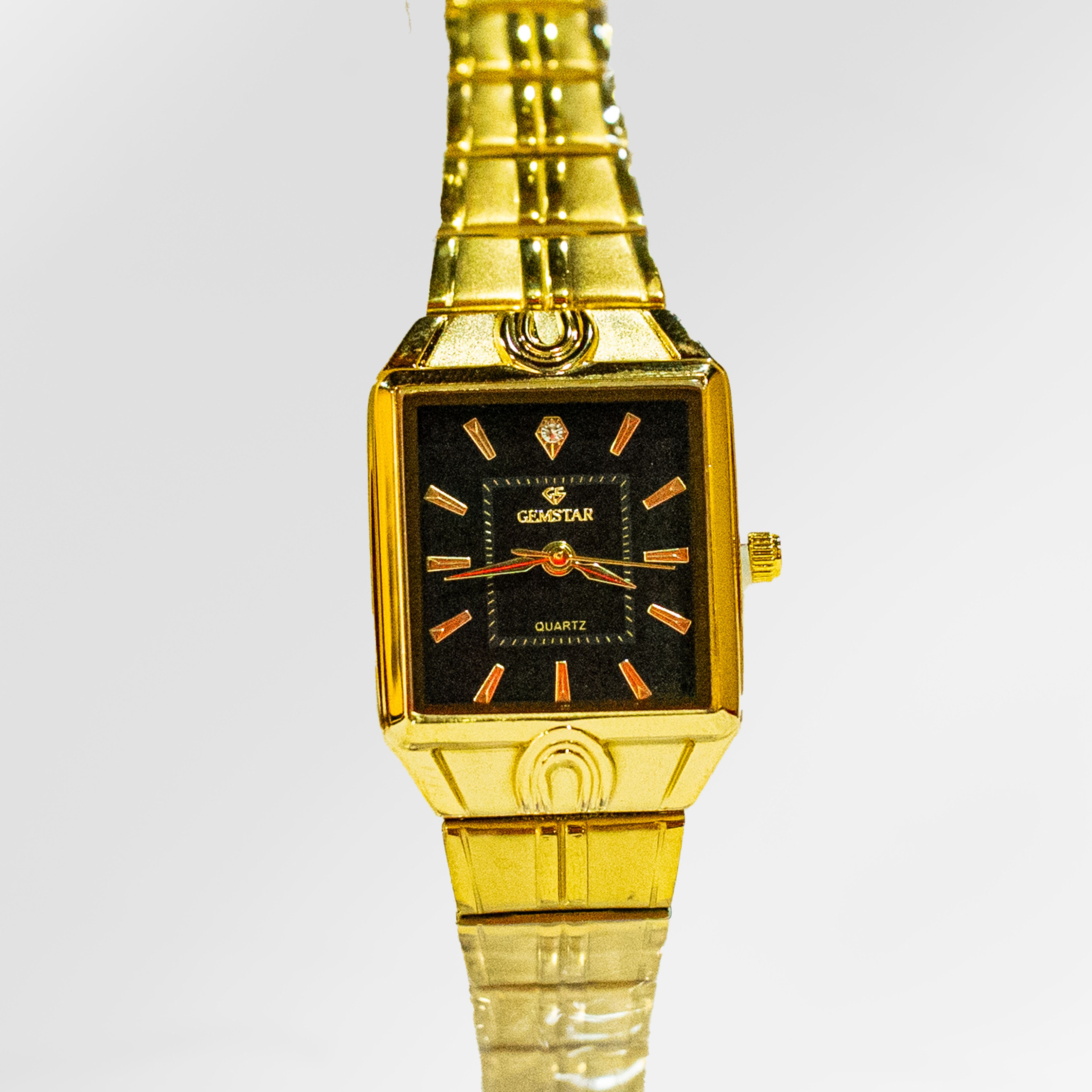 Gemstar Ladies Rectangle Black Dial Gold