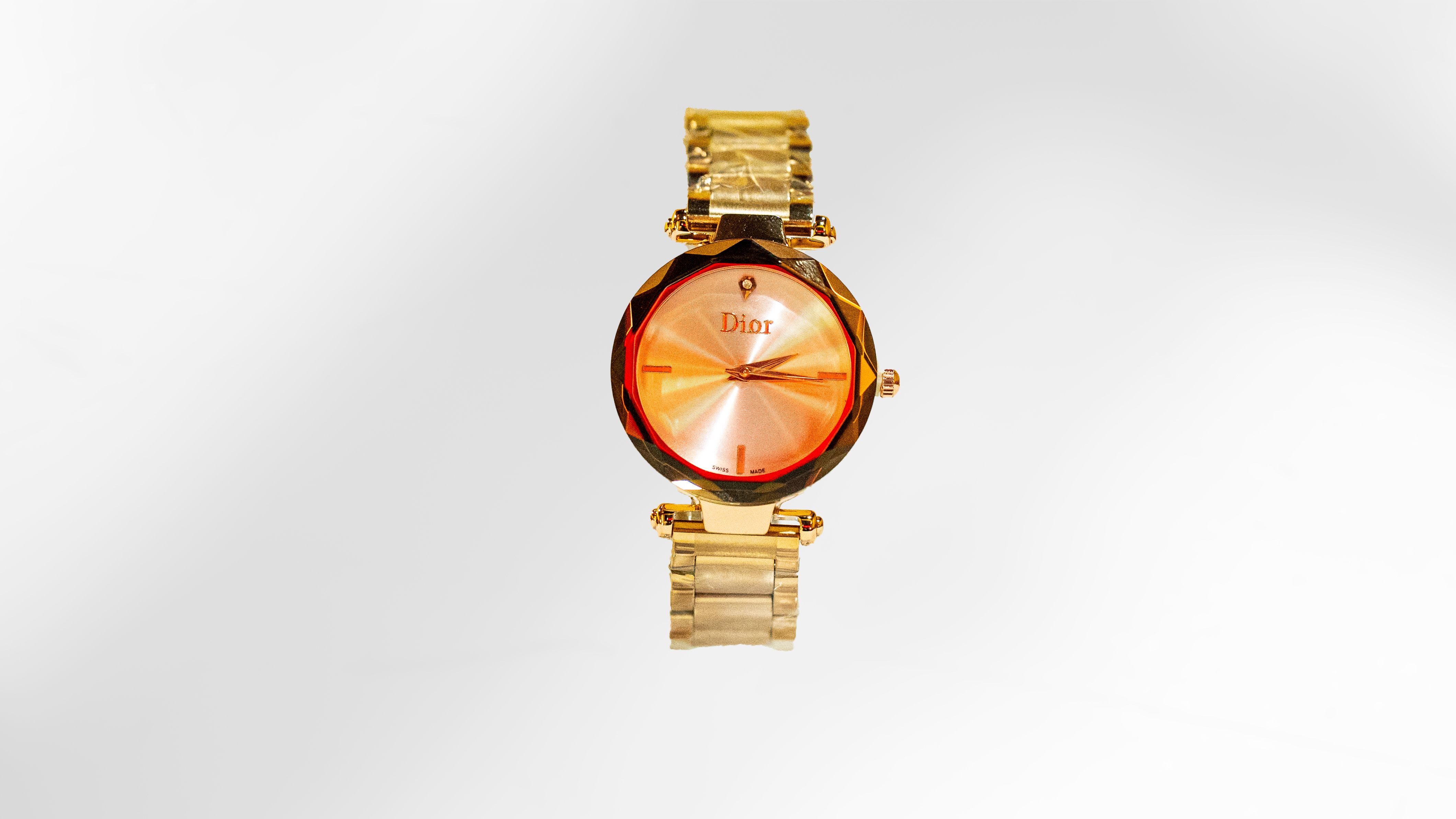 Dior Faceted Gold Sunburst Ladies Watch