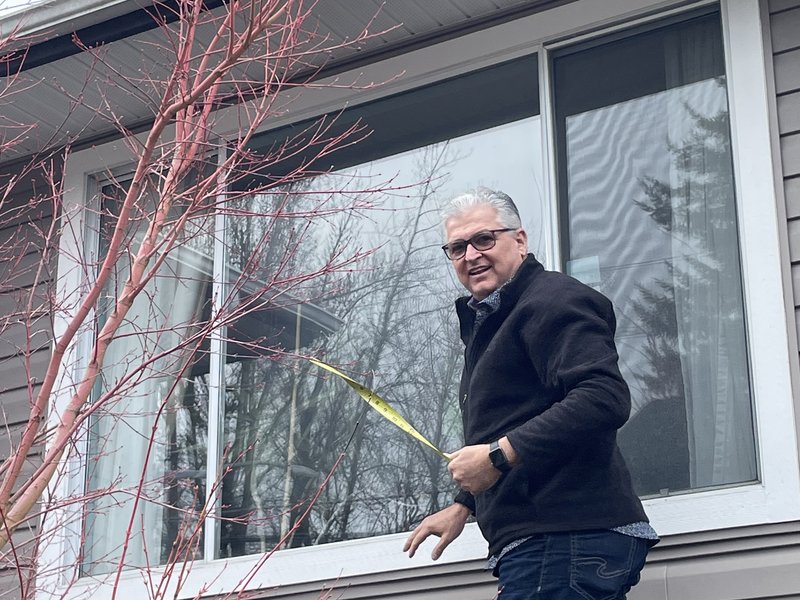 Exterior view of a finished dual-pane vinyl window install