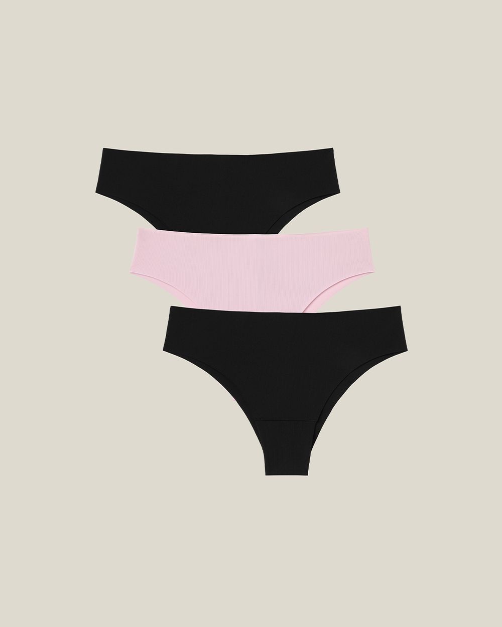 Tre bikinislipar i svart och ljust rosa med enkel och smidig design för vardagskomfort.