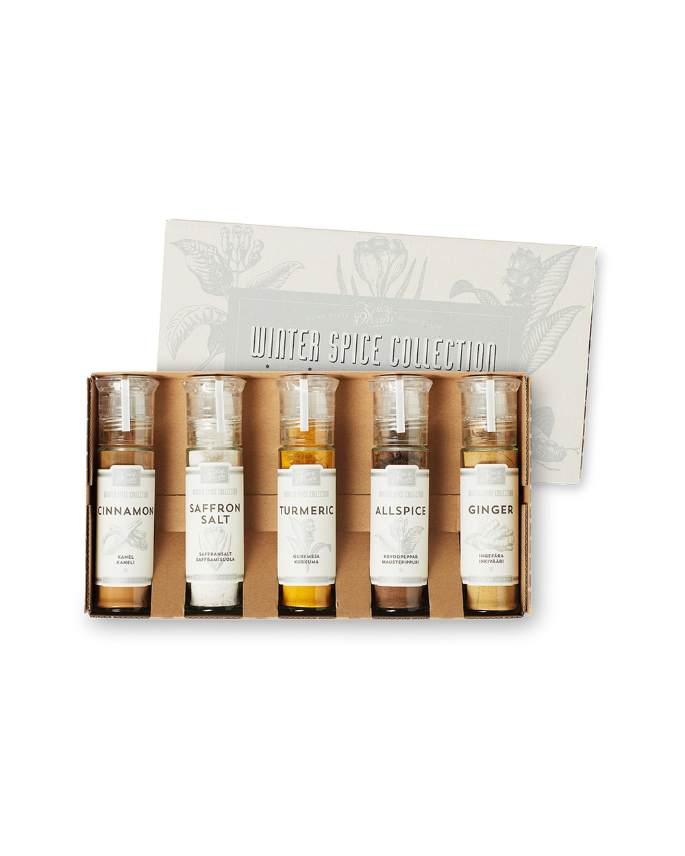 Fem små glasburkar med kryddor i en kartong, märkta kanel, saffranssalt, gurkmeja, kryddpeppar och ingefära. Locket är genomskinligt och etiketterna har en enkel, stilren design.