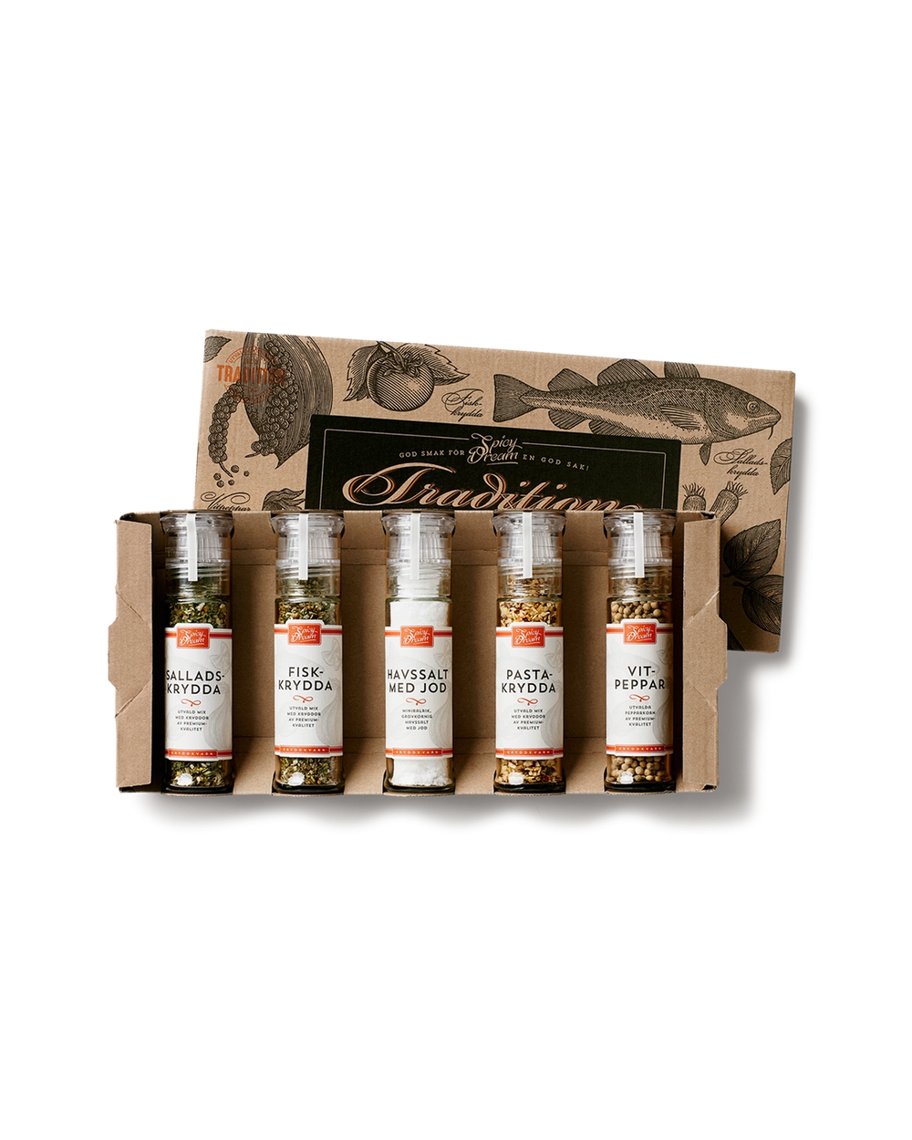 Fem kryddburkar med svart lock i en kartong med illustrationer av fisk och grönsaker, märkta salladskrydda, fiskkrydda, havssalt med jod, pastakrydda och vitpeppar.