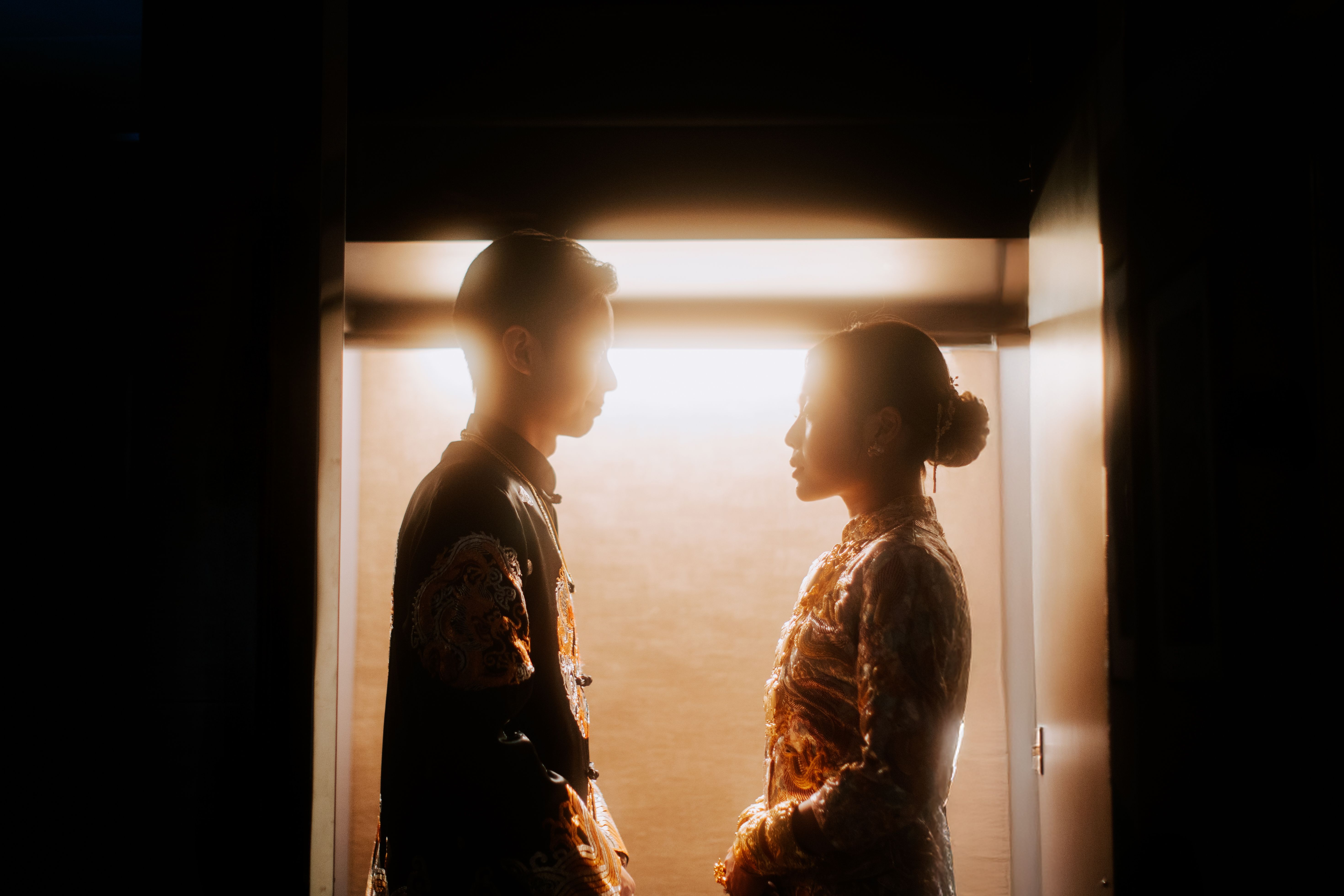 Newlyweds together at blue hour in Hong Kong