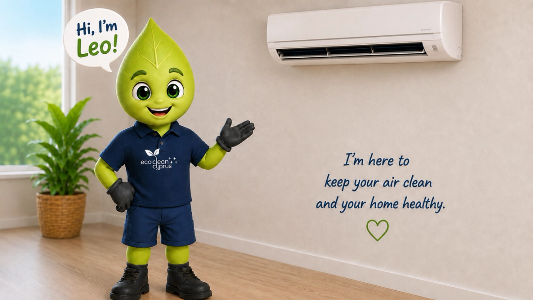 Leo from Eco-Clean Cyprus beside a wall-mounted air conditioner