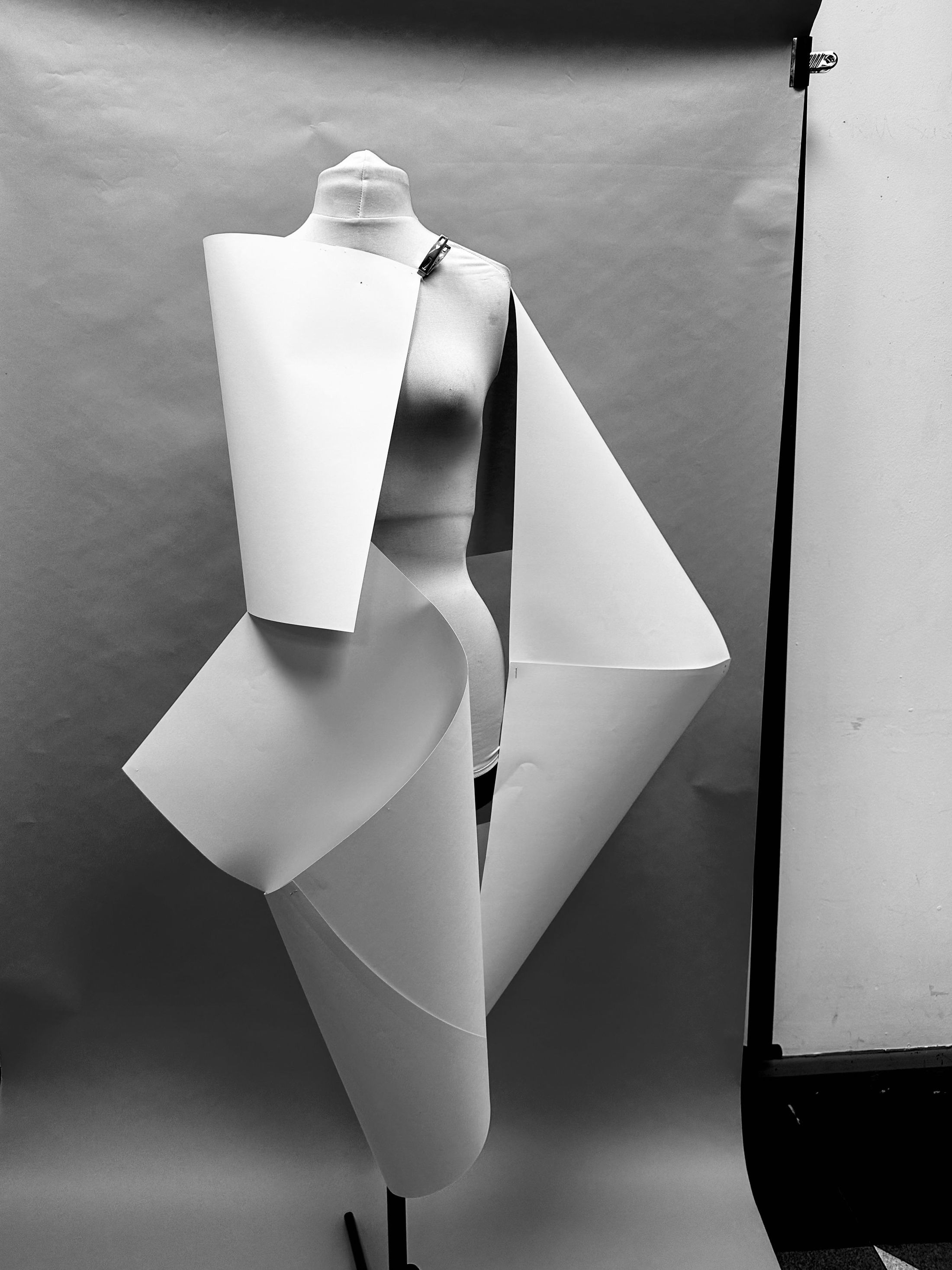 Illustrative figure walking through a vaulted gallery