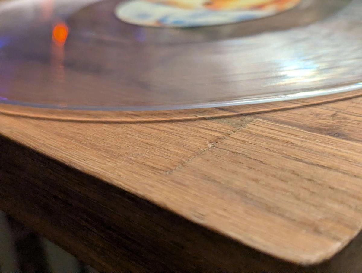 Woodgrained turntable with a clear vinyl record