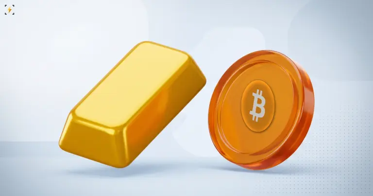 Золотой слиток и янтарная биткоин-монета на ребре
