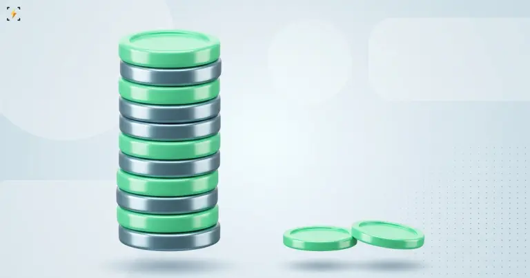 Tall stack of mint green coins beside two small coins lying flat