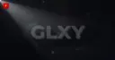 GLXY wordmark lit by a single spotlight beam on a dark background