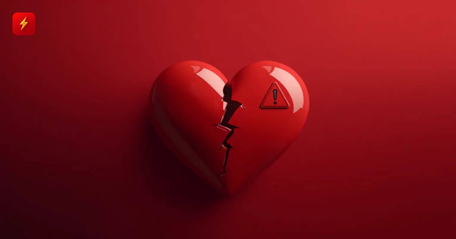 Broken heart with a warning sign