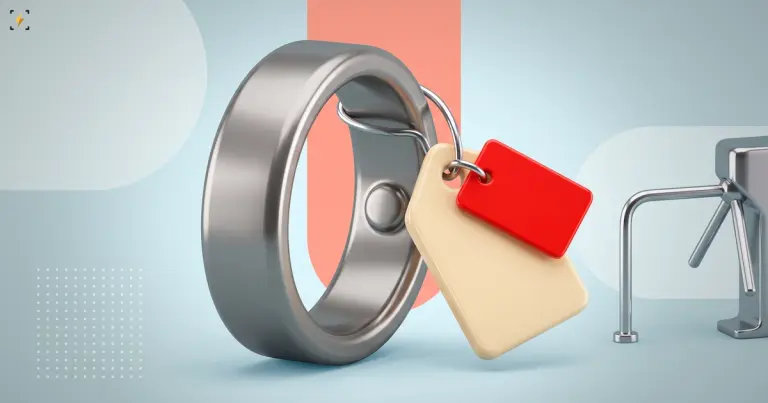 Smart ring with a blank price tag and a small red tag clipped over it, a closed turnstile beyond