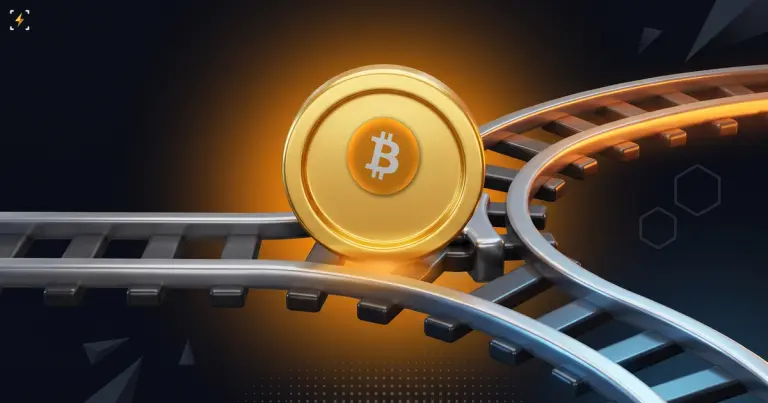 A gold bitcoin coin standing at a railway switch where one track splits into two