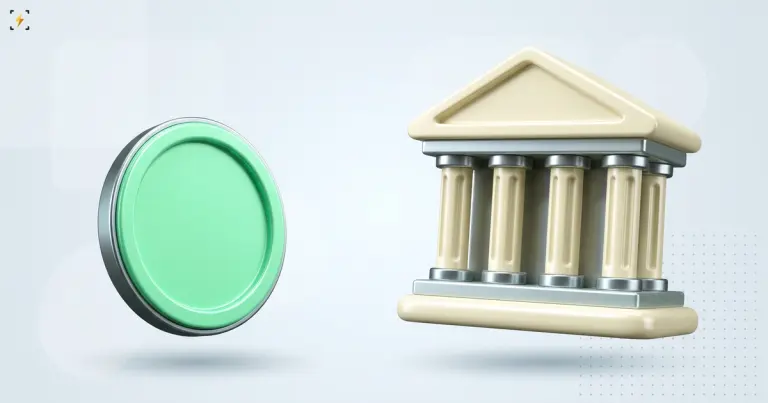 Mint coin standing on edge beside a pale bank building