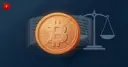 A cracked Bitcoin coin symbolizing an internal threat to the network's rules